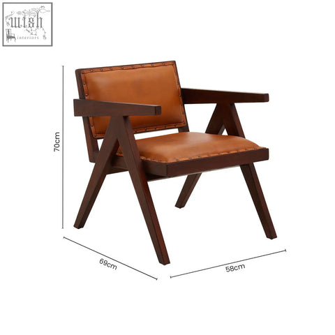 Brown tan leather armchair with dark teak frame dining chair featuring angled legs and leather upholstery