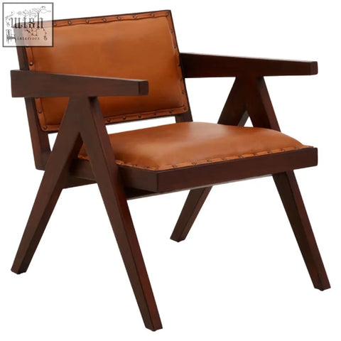 Inca tan leather and teak frame dining chair with brown tan leather upholstery and angled dark wood frame legs