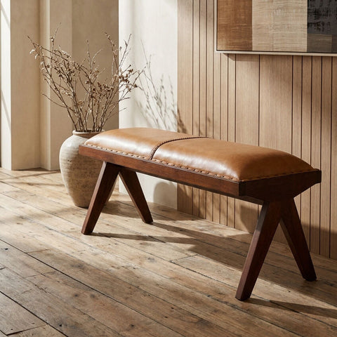 Inca tan leather and teak wood bench with tan leather top and sturdy inverted base v-shaped legs in a sleek design