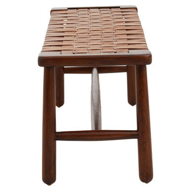 Tan leather strapped bench with brown woven seat mango wood legs and metal support bar in lattice design