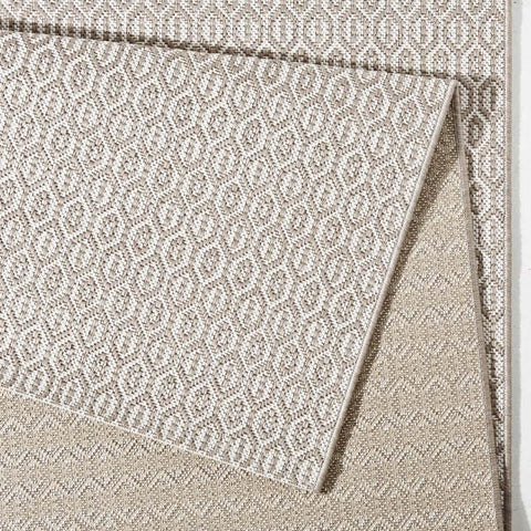 Beige indoor outdoor coin rug with woven geometric pattern perfect for indoor outdoor use