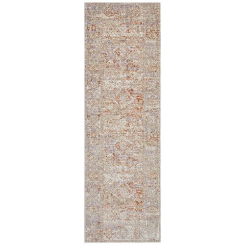 Indoor outdoor port said rug runner with faded distressed medallion design in muted beige and dusty rose tones