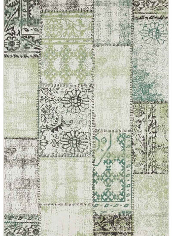 Indoor outdoor symi patchwork rug with vintage distressed look and muted green beige ornate patterns