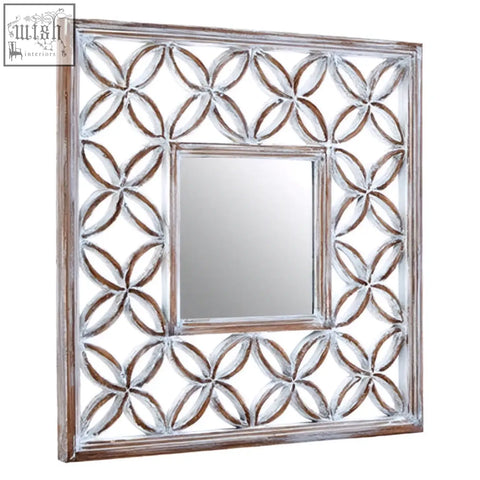 Square wall mirror with distressed silver antique white lattice frame and intricate repeating quatrefoil pattern