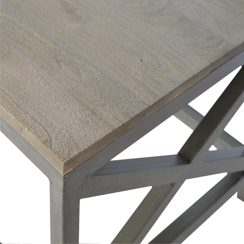 Gray wood grain tabletop industrial cross metal oatmeal coffee table with a sturdy metal frame for living room use