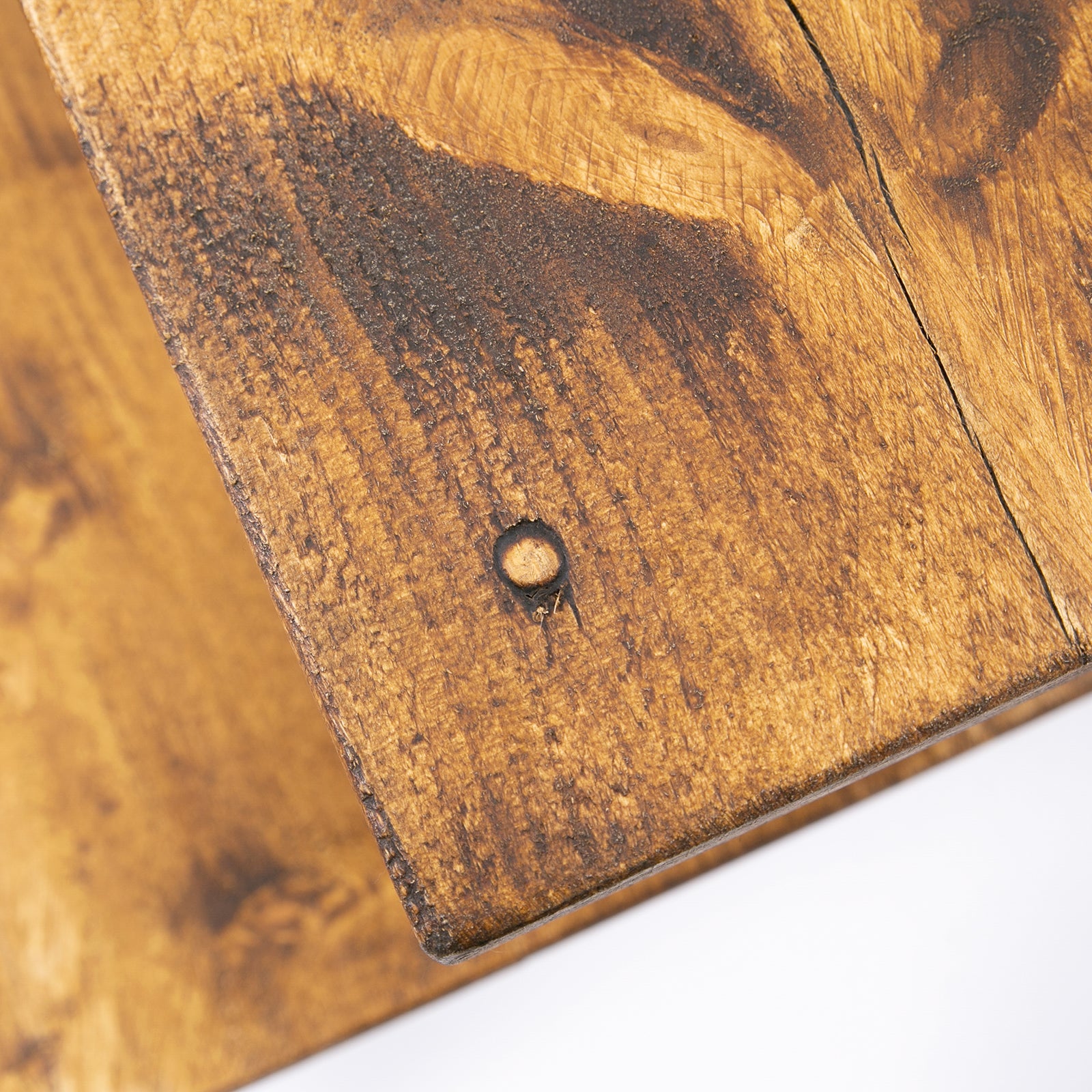 Rich warm-toned reclaimed wood corner of industrial office desk with visible grain and dark knot for home office organiser free uk delivery