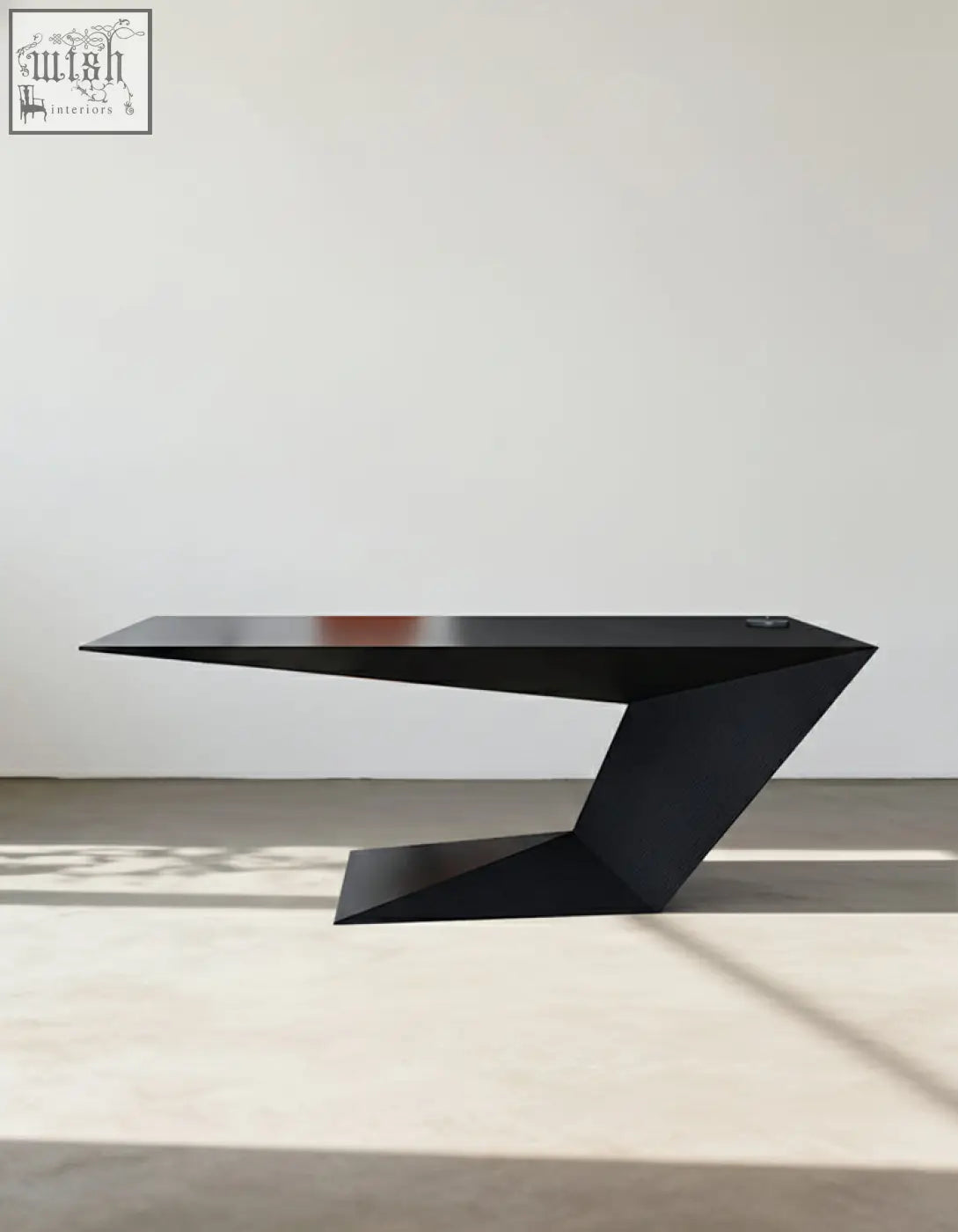 Black wood ines modern office desk with matte finish and angular geometric design for a sleek modern office desk setup