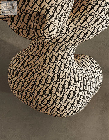 Beige and black dior oblique patterned sculptural isabeau kids animal armchair perfect for coffee table set areas