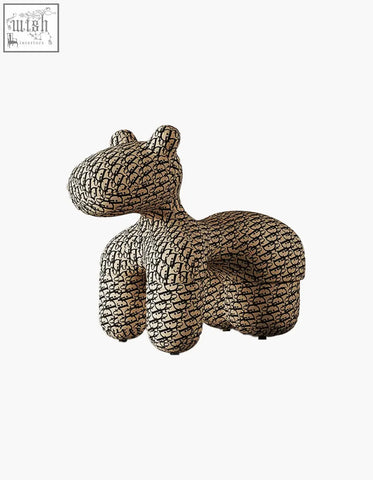Beige upholstered hippo-shaped stool with black monogram pattern from isabeau kids animal armchair perfect for coffee table set use