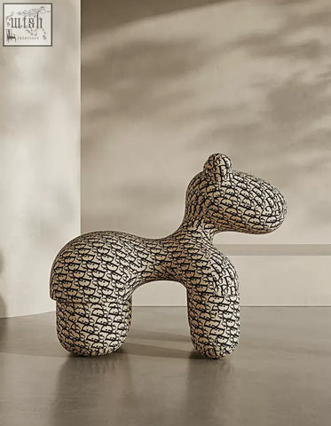 Isabeau kids animal armchair shaped like a dog with black and white upholstery perfect for a fun coffee table set