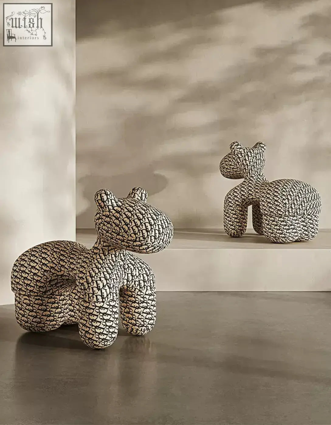 Two black and white textured ceramic hippo stools with woven design perfect for a kids animal armchair table set