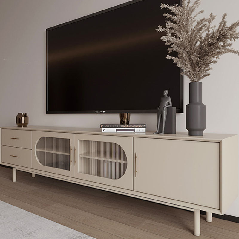 Beige mid-century modern isabella tv stand with oval glass door panels and slender legs for stylish storage