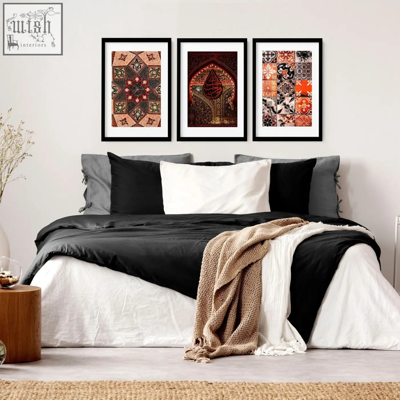 Three framed islamic wall art prints with intricate geometric and calligraphic designs in warm earth tones above a bed