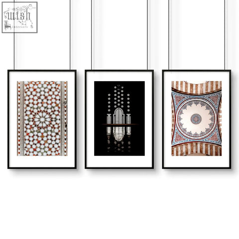 Three black-framed islamic wall art prints with intricate architectural designs in earthy tones perfect for home decor