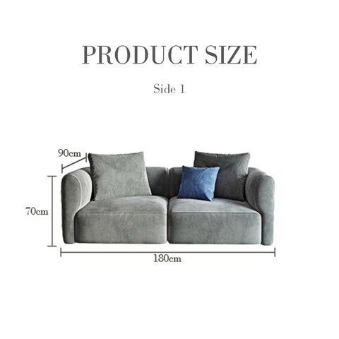 Modern gray velvet isolde three seater corner sofa with plush armrests and navy blue accent pillow