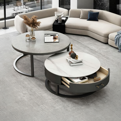 Modern round ivan nesting coffee table with sleek gray sintered stone top and black metal frame featuring drawer storage