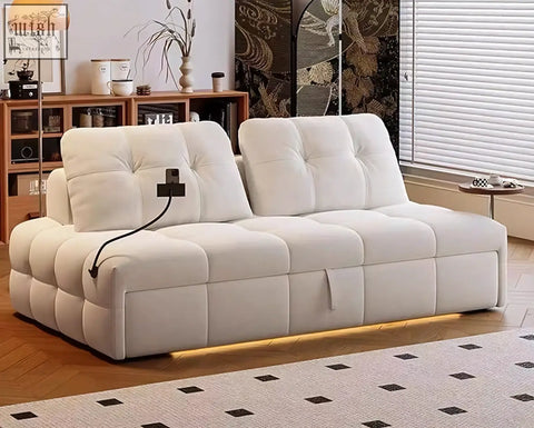 Cream-colored tufted ivanov two seater sofa bed with segmented cushioning and side smart phone holder offer financing and shipping cost available