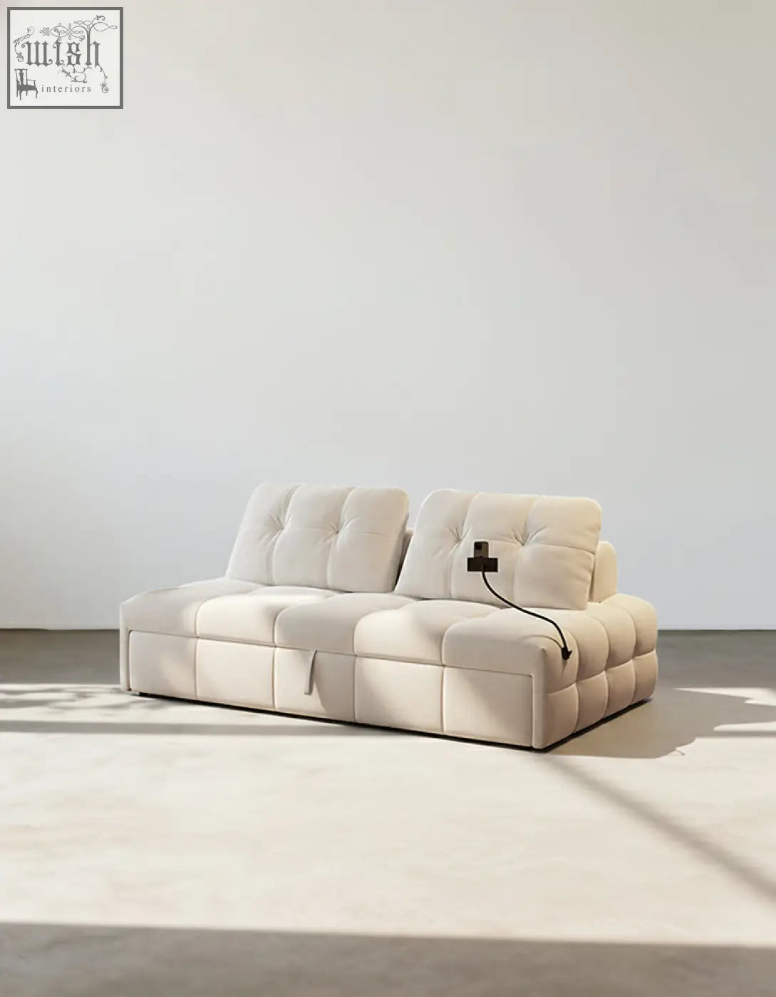 Cream-colored tufted ivanov two seater sofa bed with modular segmented cushioning and side smart phone holder offer financing and shipping cost available