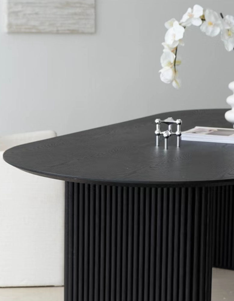 Black oval dining table with vertical ribbed legs solid wood ivar oval dining table with sleek modern design