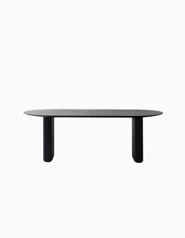 Black ivar oval dining table with solid wood oval top and sleek fluted legs perfect for dining table setups