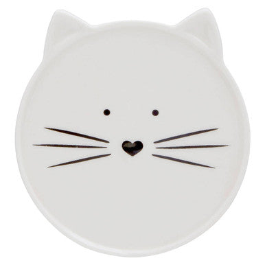 Ivory cat mug coaster made of white ceramic shaped like a cat with black whiskers and a heart nose