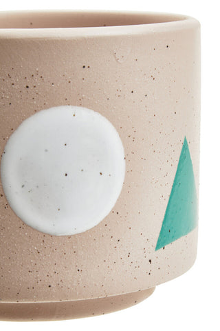 Beige speckled ceramic jada small abstract planter with white circle and teal triangle design perfect for small plants