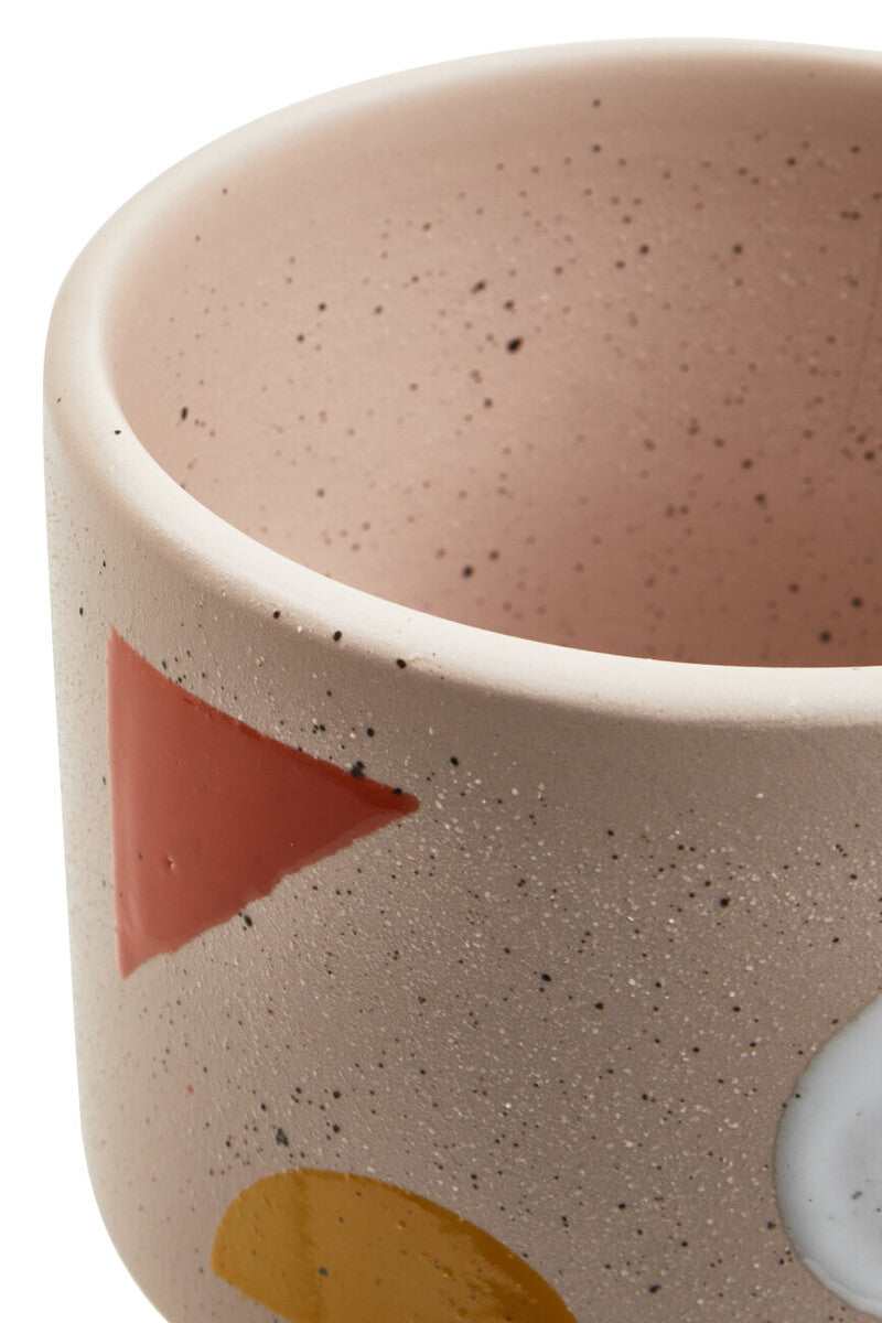A jada small abstract ceramic planter with a speckled beige matte finish and coral mustard geometric shapes