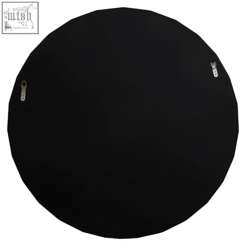 Black circular wall mirror with silver hanging hardware perfect as a round silver wall mirror decor piece