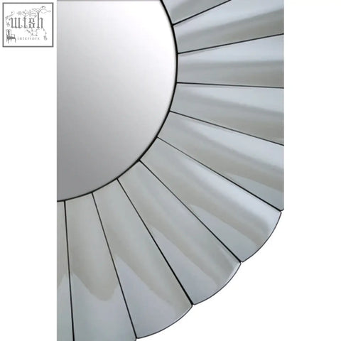 Jade round silver wall mirror with silver sunburst design and reflective segmented silver wall mirror finish