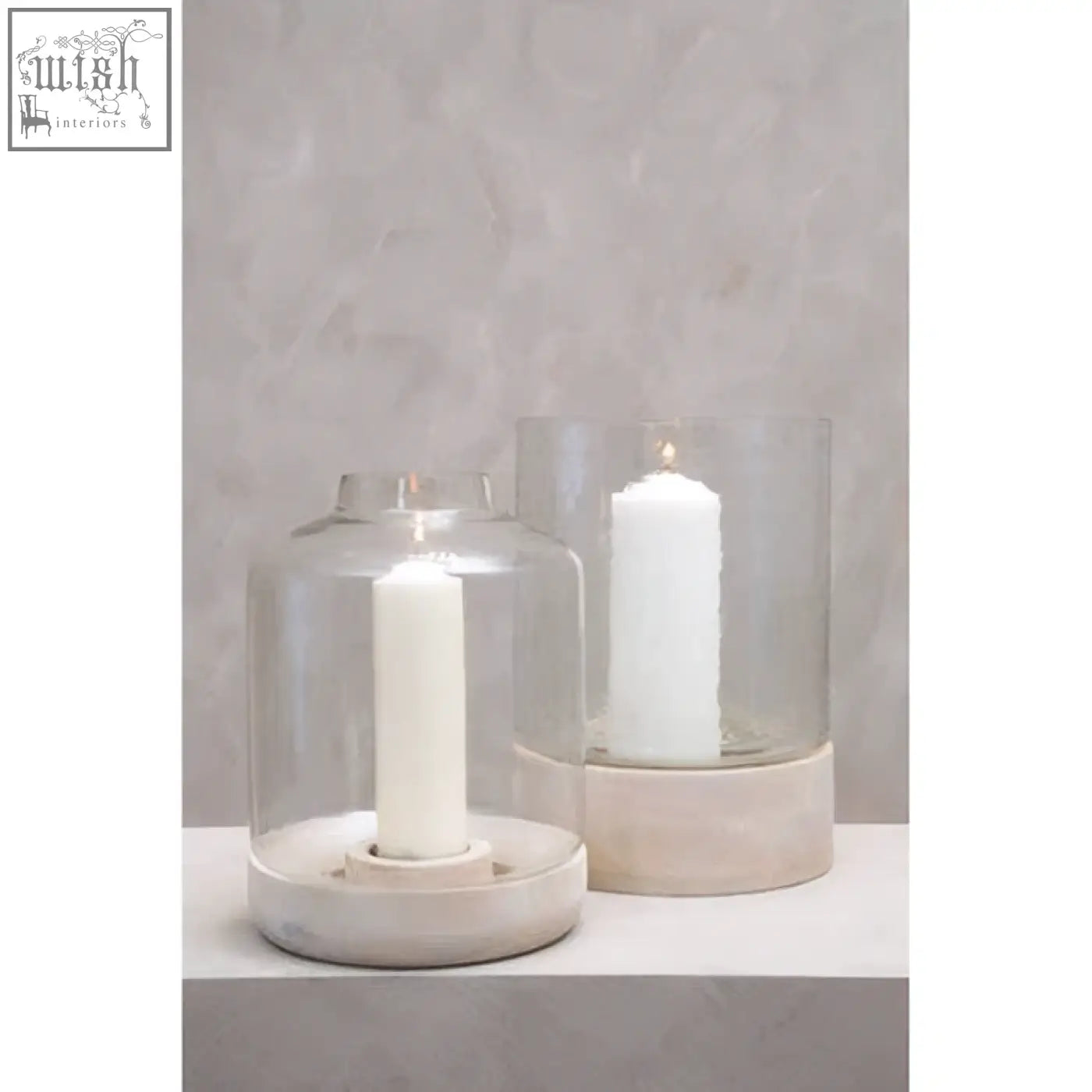 Clear glass jain large hurricane candle holder with matte white ceramic base perfect large hurricane candle decor