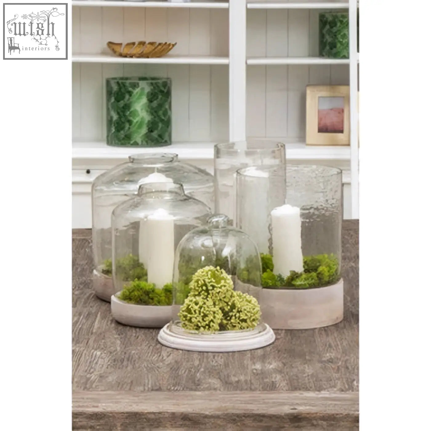 Jain large hurricane candle holder with clear glass cloches on beige ceramic bases housing moss and white candles