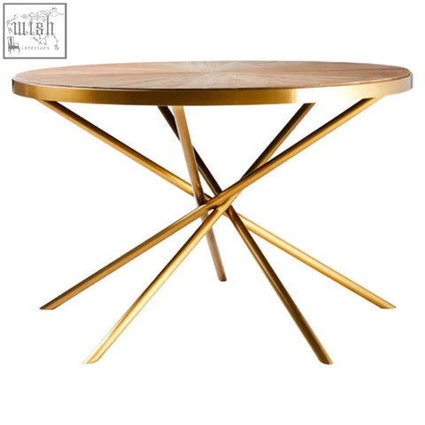 Jana round fir wood dining table with gold-finished metal intersecting legs and round wooden top