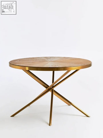 Jana round fir wood dining table with round wooden top and golden x-shaped metal base for stylish dining rooms