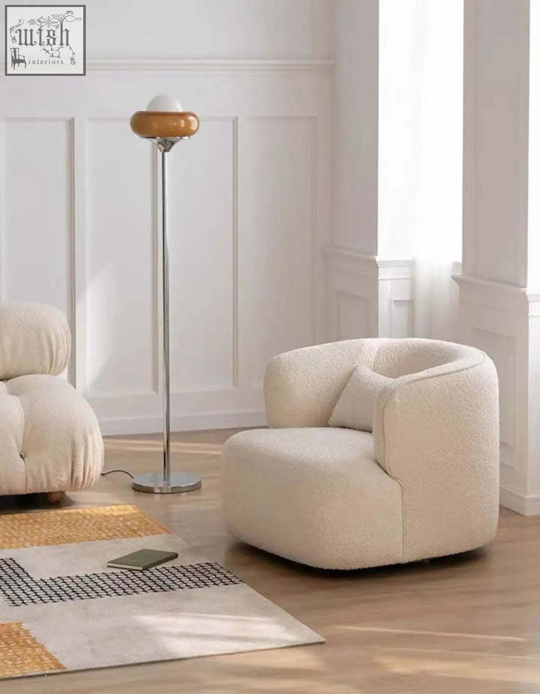 Cream-colored plush janet armchair with soft textured fabric finish, velvet armchair alternative to green velvet armchair