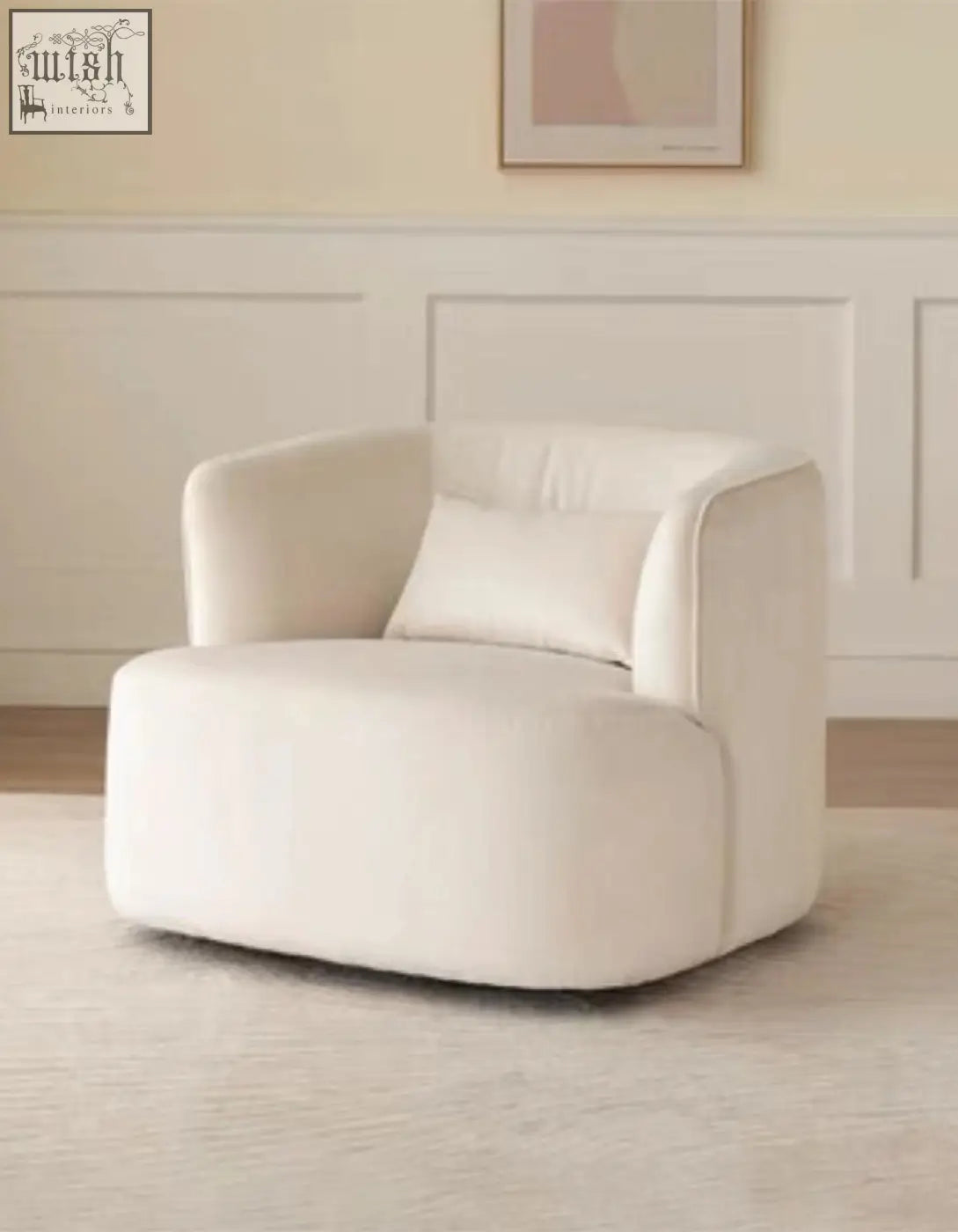 Cream-colored velvet armchair with plush rounded design and matching cushion from the janet armchair collection