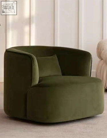Olive green velvet armchair janet armchair with plush rounded design and matching cushion for cozy seating
