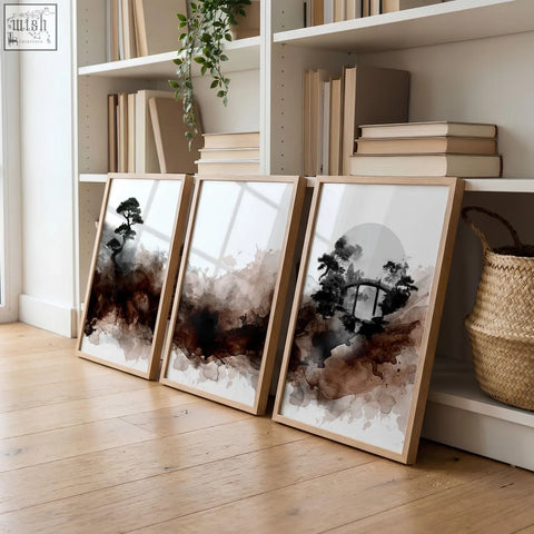 Three framed japandi ink wash wall art prints with dark tree silhouettes in brown tones for living room decor