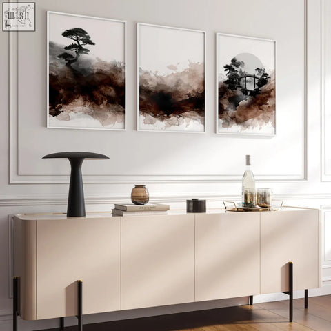 Cream-colored sideboard with sleek black legs below japandi ink wash wall art canvas in brown tones for living room