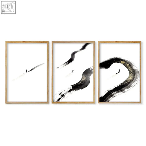 Set of three japandi wall decor black ink brushstroke prints with gold accents in light wood frames