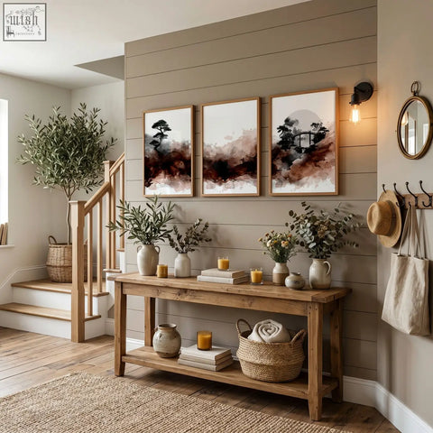Rustic wooden console table with shelves holding vases candles books and basket below japanese wall art set of 3