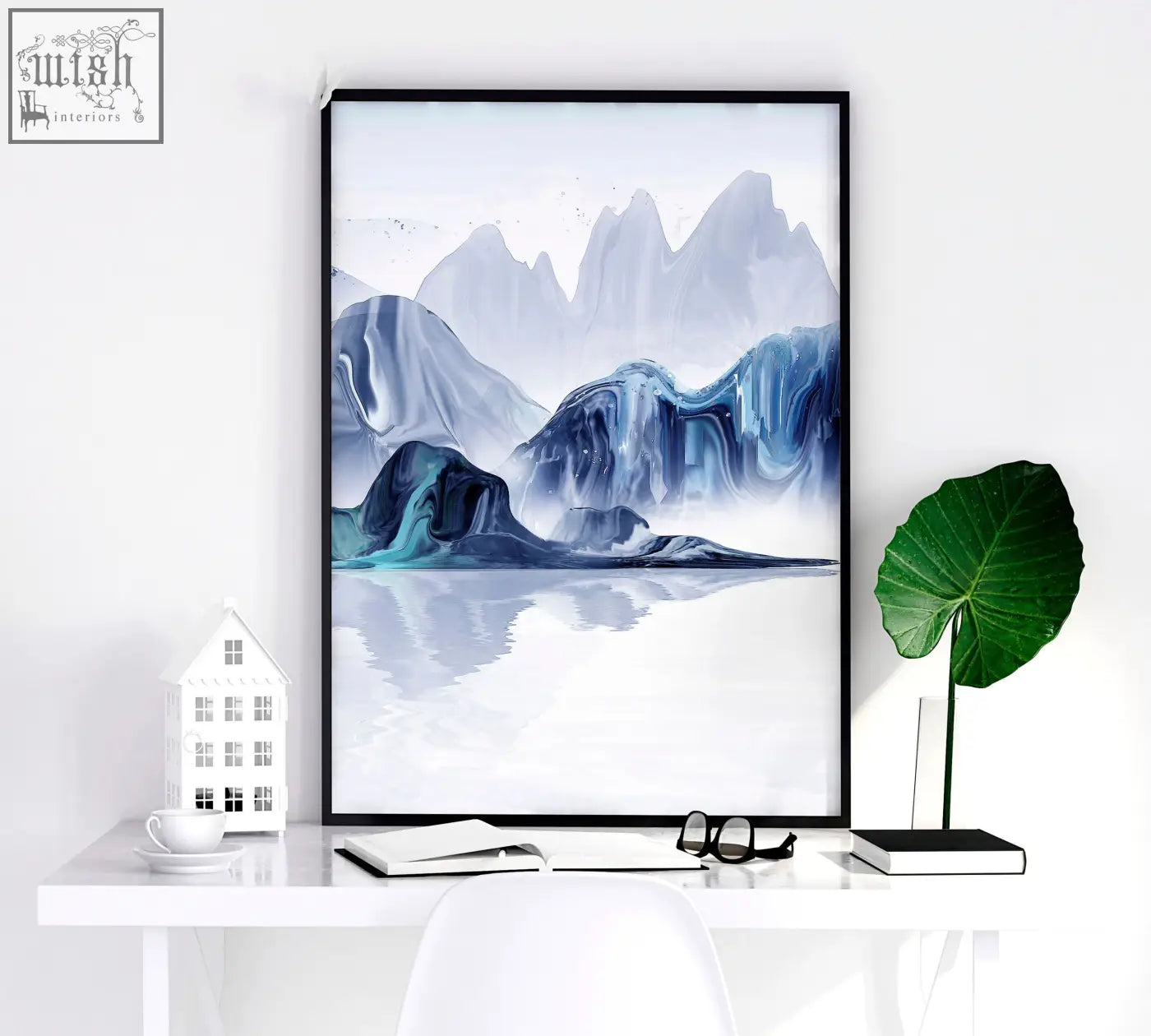 A set of 3 japanese wall art prints featuring abstract blue and gray mountain designs in sleek black frames for bedroom decor