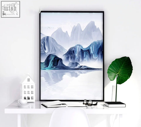 A set of 3 japanese wall art prints featuring abstract blue and gray mountain designs in sleek black frames for bedroom decor