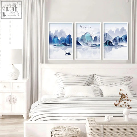 Set of 3 minimalist white framed wall art prints featuring blue and white abstract mountain landscape for bedroom decor