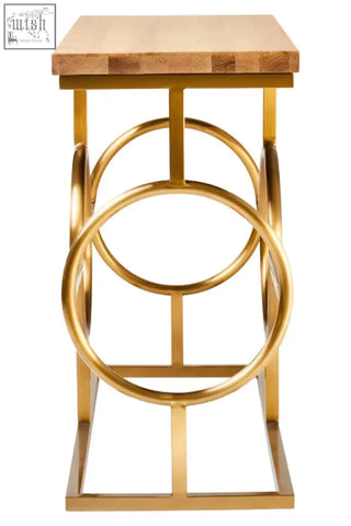 Gold metal stool with light wood top and circular ring design featured with jarloi console table style
