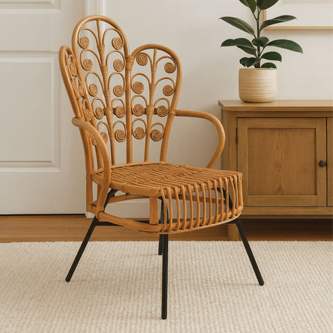Woven java natural rattan scalloped back chair with decorative swirling backrest and black metal legs