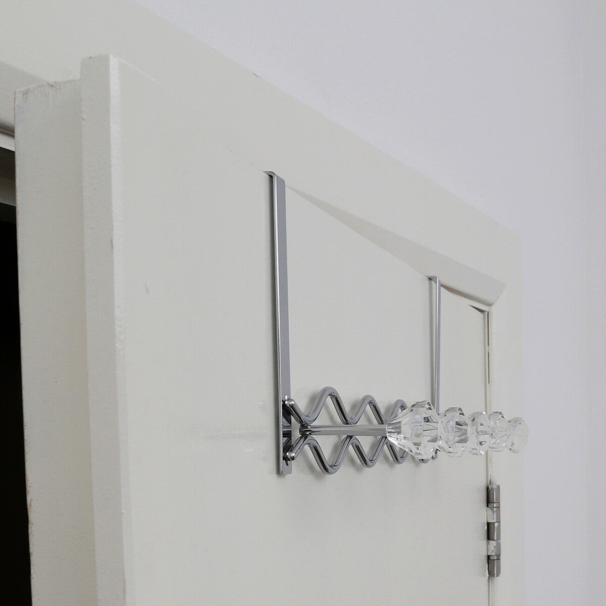 Jaxen chrome door hanger with five diamante hooks and clear crystal knobs in a sleek chrome finish