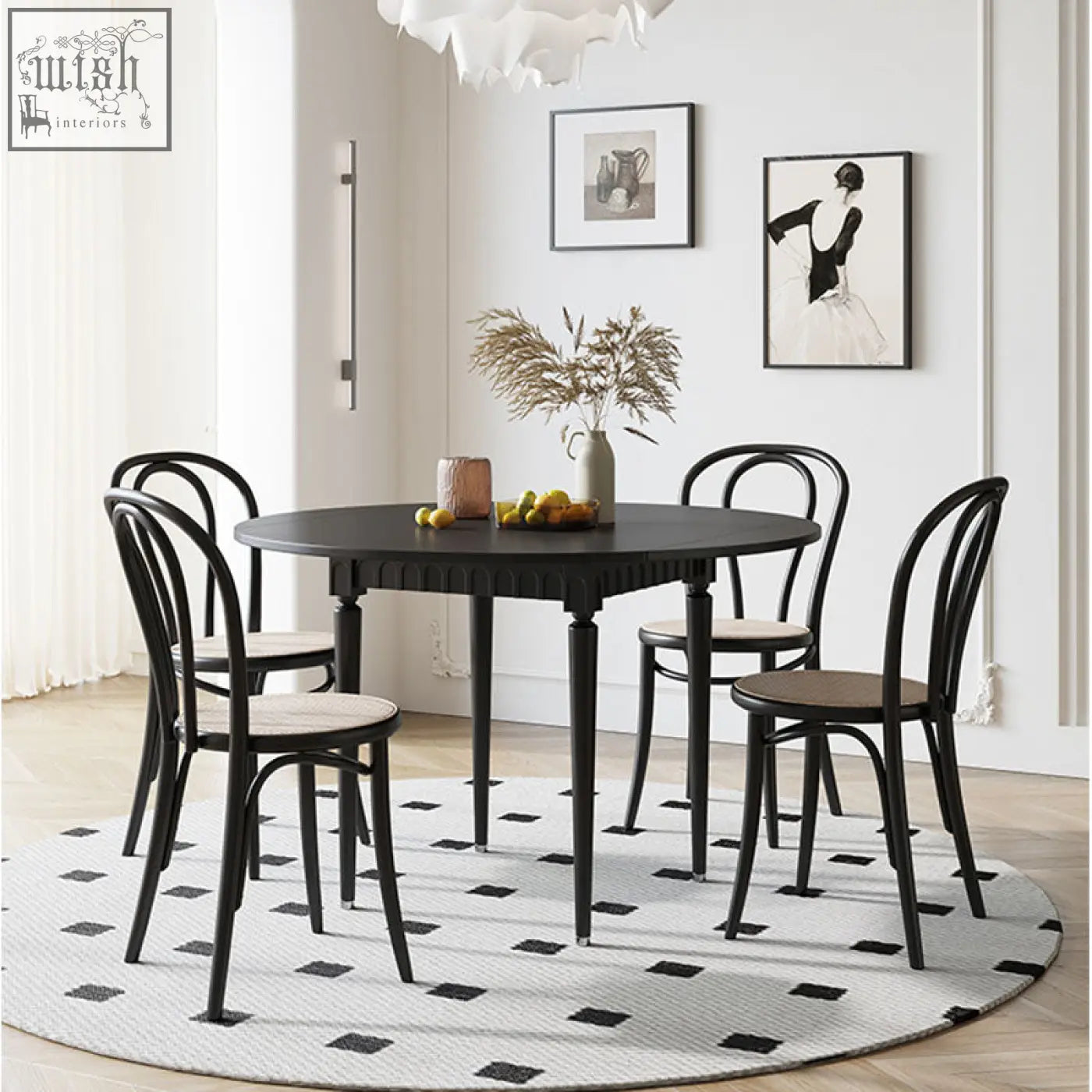 Black round wood dining table with slender legs and jayla wood dining chairs featuring bentwood design