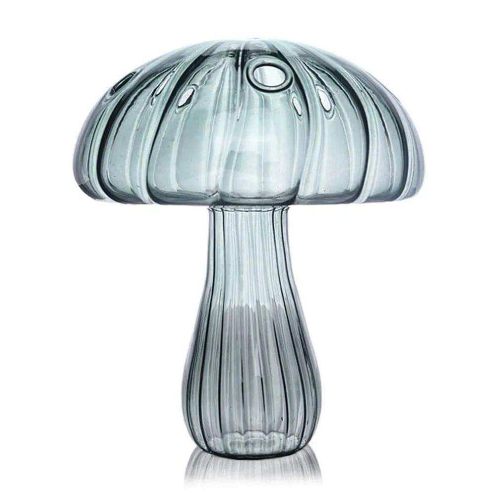 Translucent gray glass jelly mushroom vase with vertical ribbed texture and rounded cap with circular indentations