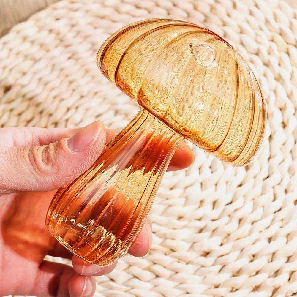 Translucent amber glass jelly mushroom vase with ribbed texture and small circular cap detail ideal as a decorative piece