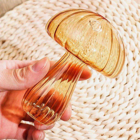 Translucent amber glass jelly mushroom vase with ribbed texture and small circular cap detail ideal as a decorative piece